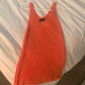An orange tank top from Vici! Never worn and a size large.